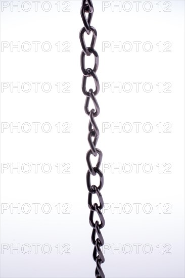 Metal chain on white background