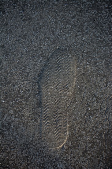 Footstep pattern seen on a concrete background