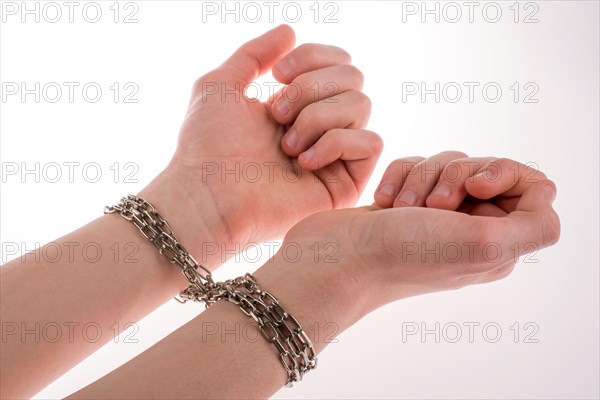 Hands in chains on a white background