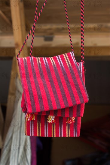 Traditional style handmade woven bags made of fabric