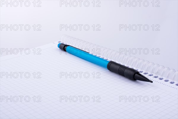 Mechanical pencil of various color on white background