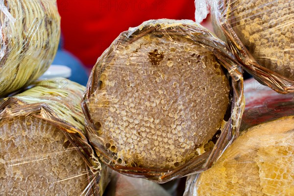 Sweet fresh honey in the sealed comb frame