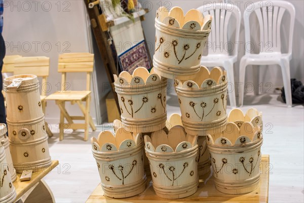 Set of buckets made of wood in a market place