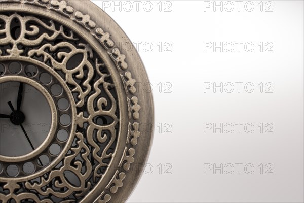 Retro style pocket watch on white background