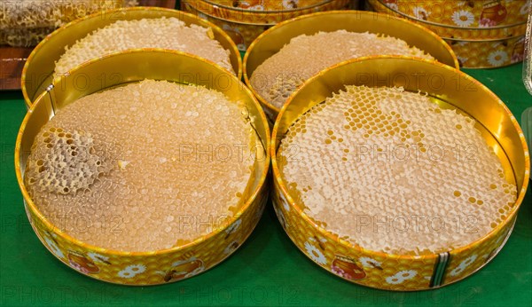 Sweet fresh honey in the sealed comb frame