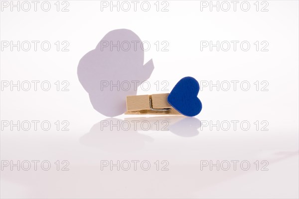 Speech buble clipped with clothespin on a white background