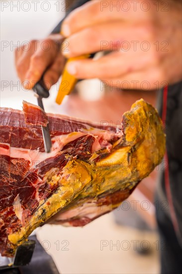 Iberian ham cutter man at a wedding