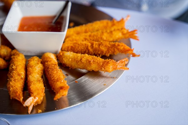 Shrimp or prawn battered with breadcrumb dough at an event at the buffet