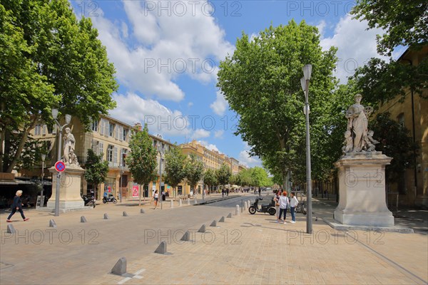 Famous Cours Mirabeau Boulevard with two statues