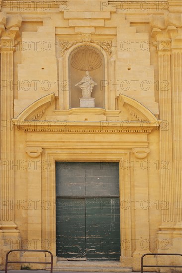 Portal with figures and decorations at the Sacré-Coeur Grammar School