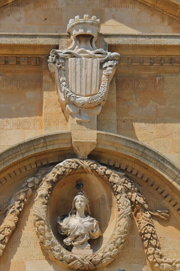 City coat of arms with crown and bust at the Hôtel de Ville