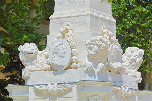 Lion figures and medallion at the ornamental fountain Fontaine des Prêcheurs