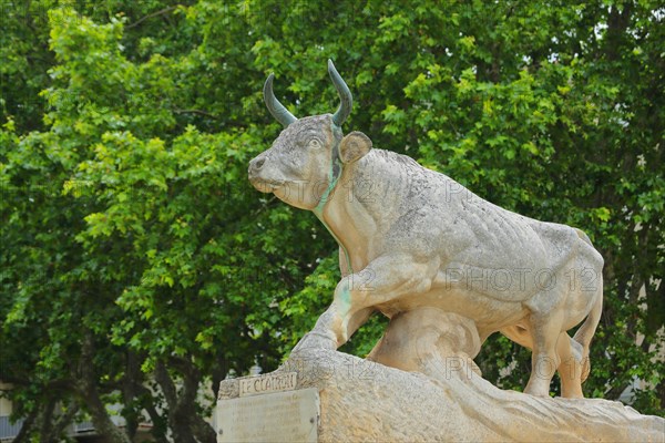 Bull figure with stone