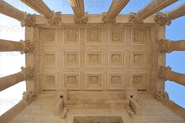 Ceiling and columns with decorations from the ancient Roman UNESCO podium temple Maison Carrée