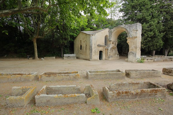 Stone sarcophagi and archway Alyscamps