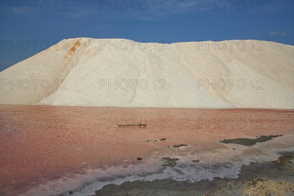 Salt mountain with water at saline for salt extraction