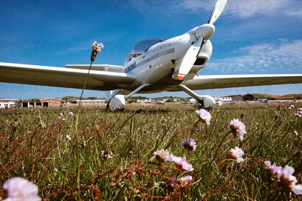 Motor glider Super Dimona HK 36 on the airfield of the island of JuiSt East Frisia