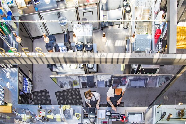 View from the upper floor into a cookshop