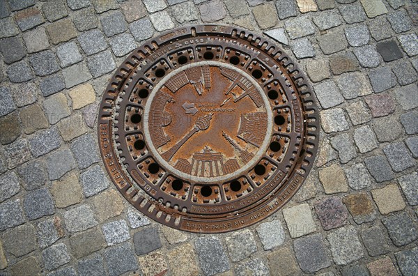 Berlin sights on a manhole cover