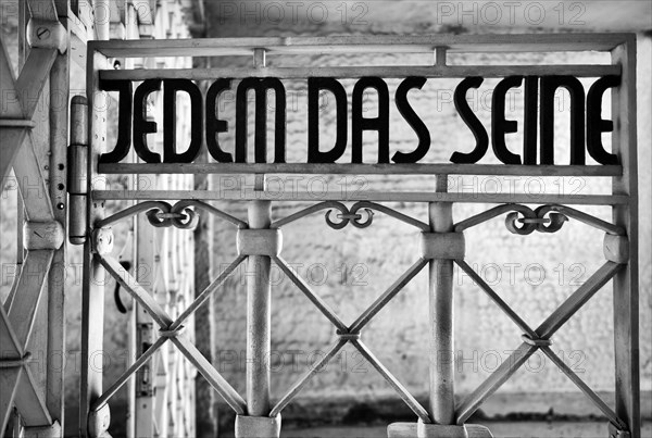 Entrance gate to beech forest concentration camp with the saying JEDEM DAS SEINE in Bauhaus script by Franz Ehrlich