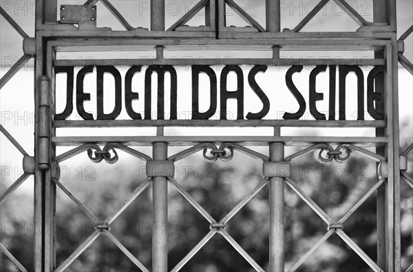 Entrance gate to beech forest concentration camp with the saying JEDEM DAS SEINE in Bauhaus script by Franz Ehrlich