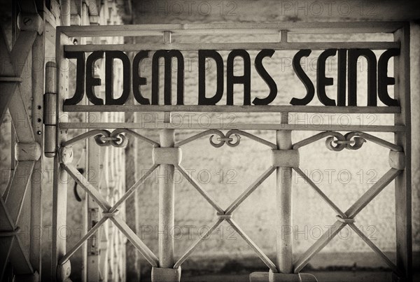 Entrance gate to beech forest concentration camp with the saying JEDEM DAS SEINE in Bauhaus script by Franz Ehrlich