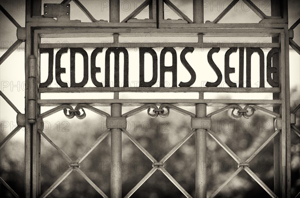 Entrance gate to beech forest concentration camp with the saying JEDEM DAS SEINE in Bauhaus script by Franz Ehrlich