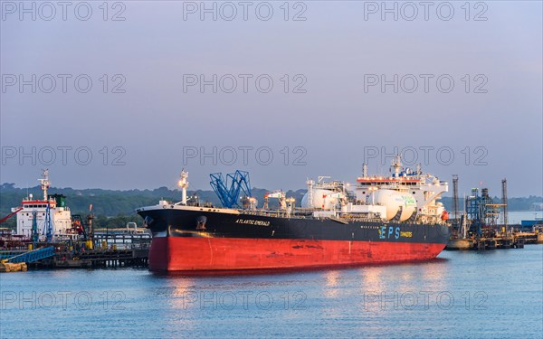 Sunrise over Gas tankers and Esso Oil Terminal