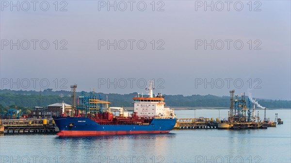 Sunrise over Gas tankers and Esso Oil Terminal