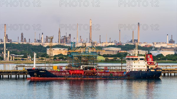 Sunrise over Gas tankers and Esso Oil Terminal