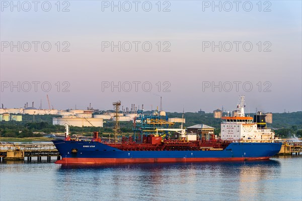 Sunrise over Gas tankers and Esso Oil Terminal