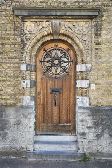 Old skin door in the old town of Veurne