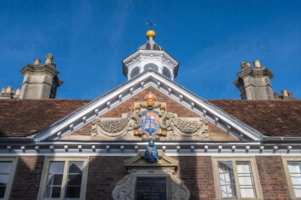 Detail of the College of Matrons built in 1682 with the Stuart royal coat of arms