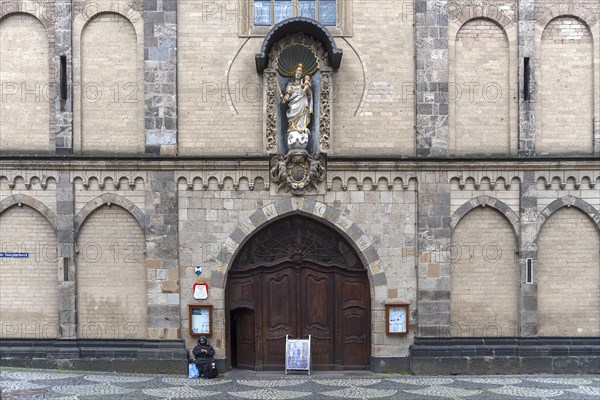 The main portal with the niche figure of Mary on the west façade of the Church of Our Dear Lady