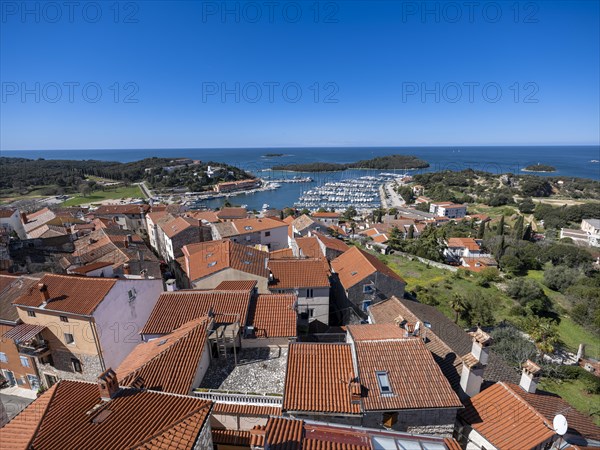 View over the roofs of the town of Vrsar to the harbour
