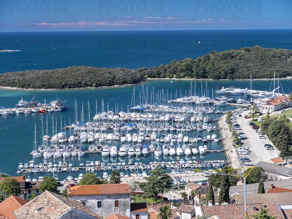 View over the roofs of the town of Vrsar to the harbour