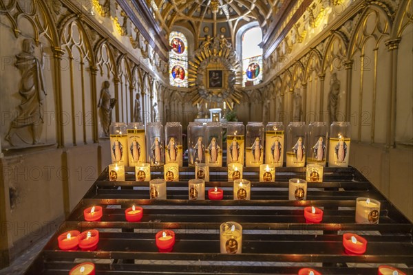 Sacrificial candles in a chapel of St John's Cathedral in Besancon