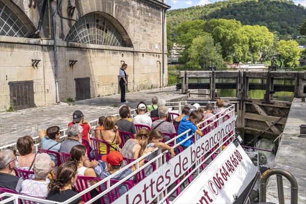 Excursion boat in a lock on the river Doubs