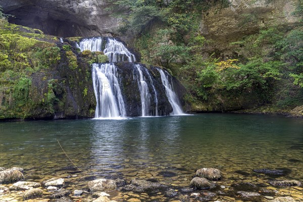 Waterfall at the karst spring of the Lison Source du Lison near Nans-sous-Sainte-Anne