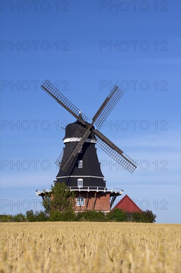 Traditional windmill in field at Krageholm