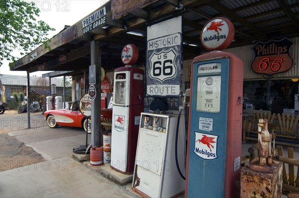 Old Corvette vintage car at gas pump of the General Store along the historic Route 66 in the Hackberry ghost town in Arizona