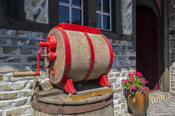 Old vintage wooden barrel-type butter churn