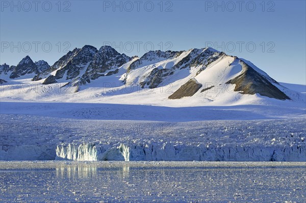 Lilliehöökbreen glacier in summer debouches into Lilliehöök Fjord