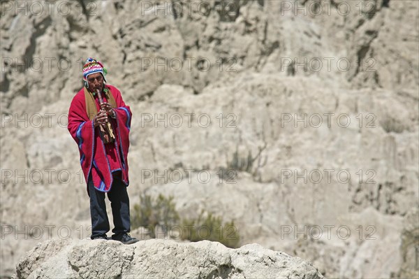Traditional flute player in the Valley of the Moon