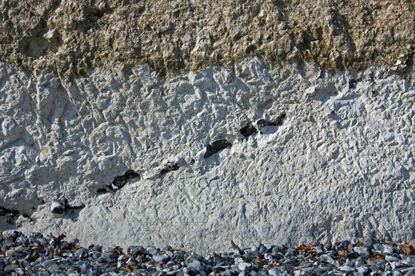 Chalk cliff showing layers of flint rock in Jasmund National Park on Rugen Island on the Baltic Sea