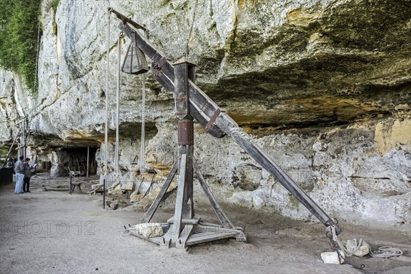 Medieval wooden derrick at stone quarry of the fortified troglodyte town La Roque Saint-Christophe