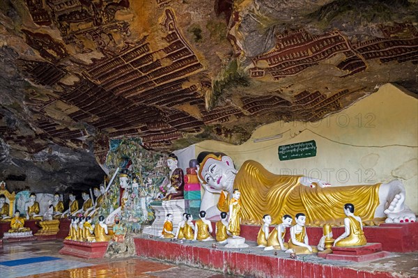 Buddha statues in the Kawgun cave near Hpa-an