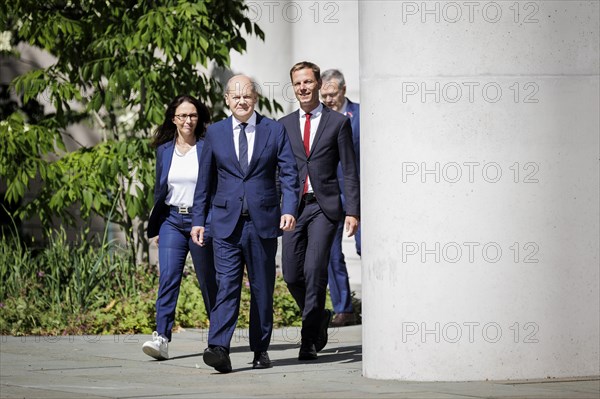 (l.t.r.) Yasmin Fahimi, Chairwoman of the German Trade Union Confederation, Olaf Scholz (SPD), Federal Chancellor, Kai Niebert, Pr?§sident of Deutscher Naturschutzring, and Jörg Dittrich, President of the German Confederation of Skilled Crafts, arrive for press statements after the Alliance for Transformation meeting in Berlin, 02.06.2023., Berlin, Germany, Europe