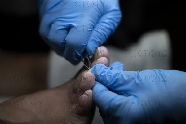 Woman Making Pedicure on Her Foot in Switzerland