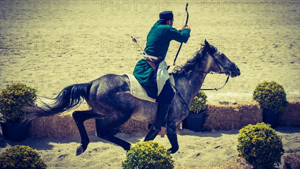 Ottoman archer riding and shooting on horseback